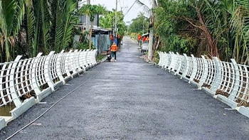 Cầu từng sụt lún ở Bình Chánh thông xe, người dân hết cảnh đi vòng 6km