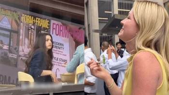 Cô gái bê tô cơm ra giữa đường xem Anne Hathaway đóng phim