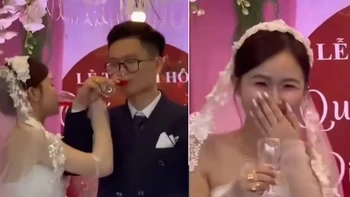 Cô dâu ngại ngùng vì uống cạn chén rượu giao bôi