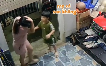 Mẹ đụng đầu vào cửa cuốn, phản ứng của con trai gây bão mạng