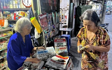 Cho tui bán báo suốt đời nghen!
