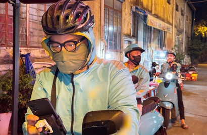 Ho Chi Minh City’s electric bike taxi riders juggle charging times and daily hustle