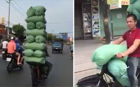 Người đàn ông đi xe máy chở 17 bao nước đá