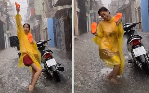 Cô gái xinh đẹp nhảy múa 'theo trend' giữa trời mưa lớn khiến người xem khó hiểu
