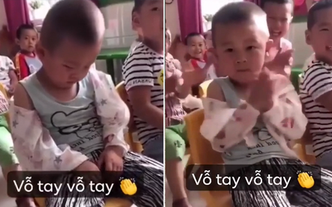 Bé trai cố tỏ ra mình tỉnh khi ngủ gật trong lớp