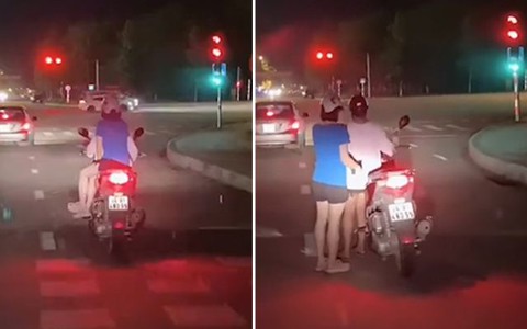 Hai cô gái đi SH 'ngượng chín mặt' khi chống được xe chờ đèn đỏ