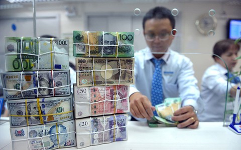 Giá USD tăng cao, bình tĩnh mà lo!