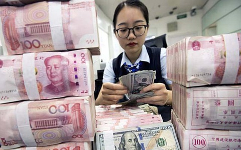 Mỗi 'công dân toàn cầu' ôm nợ 32.500 USD