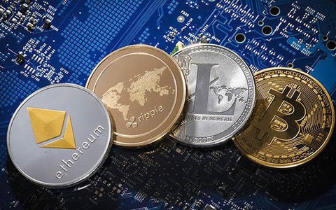 Bitcoin tăng vọt, sắp chạm 6.000 USD