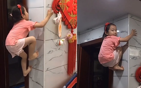 Bé gái leo tường như người Nhện