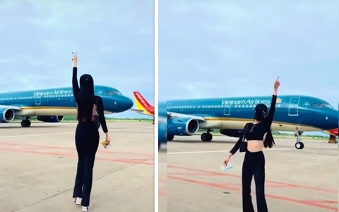 Cấm bay 6 tháng cô gái nhảy múa gần máy bay đang lăn vào sân đậu