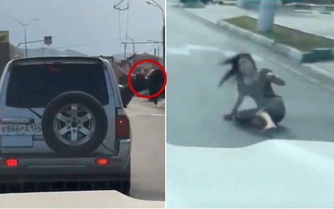 Cô gái ngã lộn nhào xuống đường vì ngồi múa ở cửa sổ ôtô