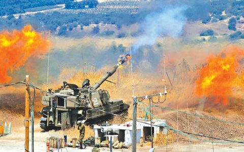 Israel nói bị Hezbollah nã hơn 1.000 quả đạn