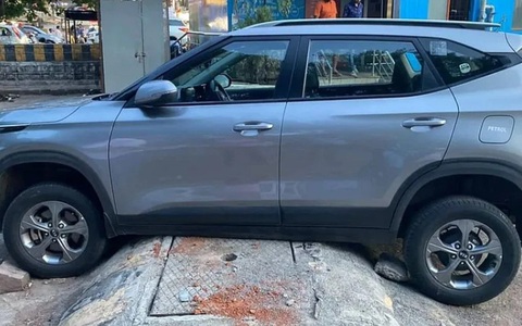 Gờ giảm tốc cao tới nỗi SUV cũng mắc kẹt