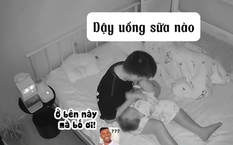 Ông bố ngáy ngủ cho con uống sữa kiểu ngược đời