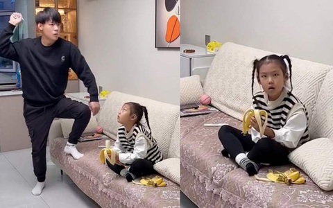 Con gái ngơ ngác khi bố làm 'ảo thuật' ăn mất quả chuối
