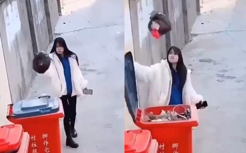 Cô gái sung sướng khi tung hứng bịch rác vào được thùng