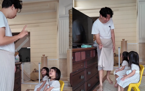 Bố mặc váy thị phạm cho con gái cách đứng ngồi