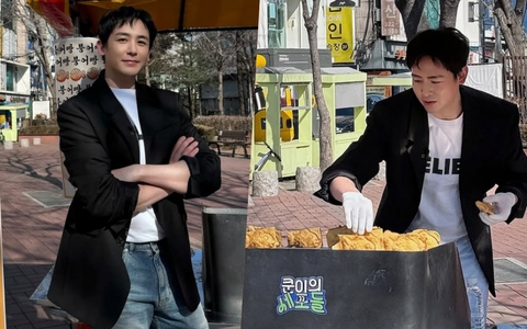 Diện mạo đẹp trai của Nichkhun (2PM) gây sốt khi bán hàng rong