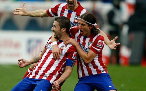 Atletico Madrid thành công với  “bóng đá bộ lạc”