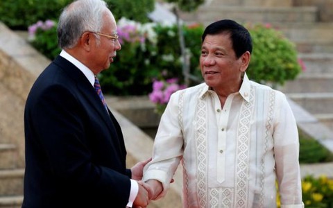 Philippines, Malaysia đồng ý “truy đuổi nóng” khủng bố Abu Sayyaf