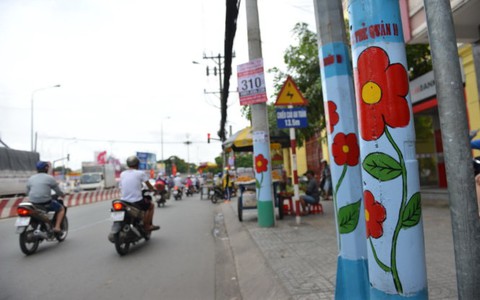 Cột điện cần sạch sẽ, không thể vẽ ngô nghê như nhà trẻ vậy!