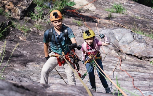 Vietnamese cave explorer, 12-year-old daughter conquer 300-meter waterfall in Hue