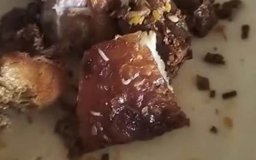 Authorities investigate claim of maggot-infested roast pork sold at Vietnam local market