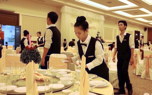 In Vietnam, is taking food home from a wedding okay?