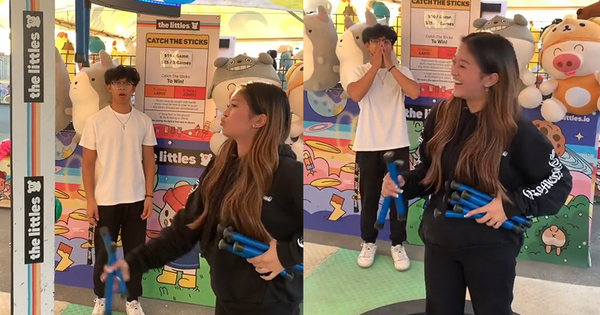 Chàng trai tròn mắt nhìn cô gái chơi trò bắt gậy siêu đỉnh