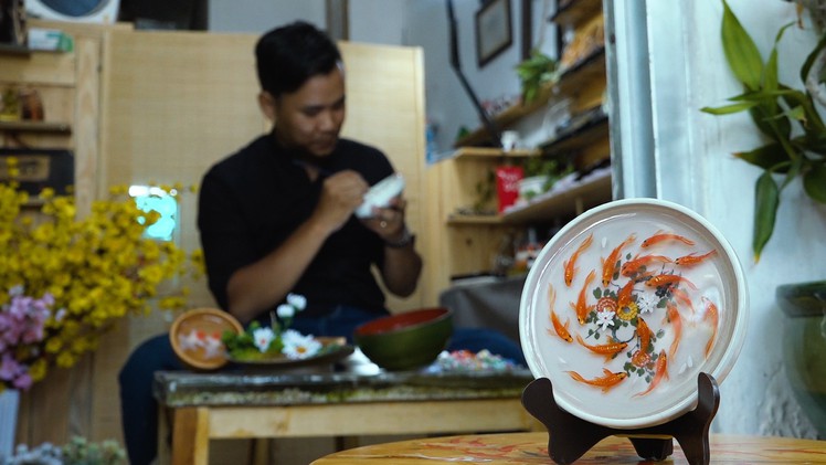 Độc đáo nghệ thuật vẽ tranh cá 3D trên gỗ dừa