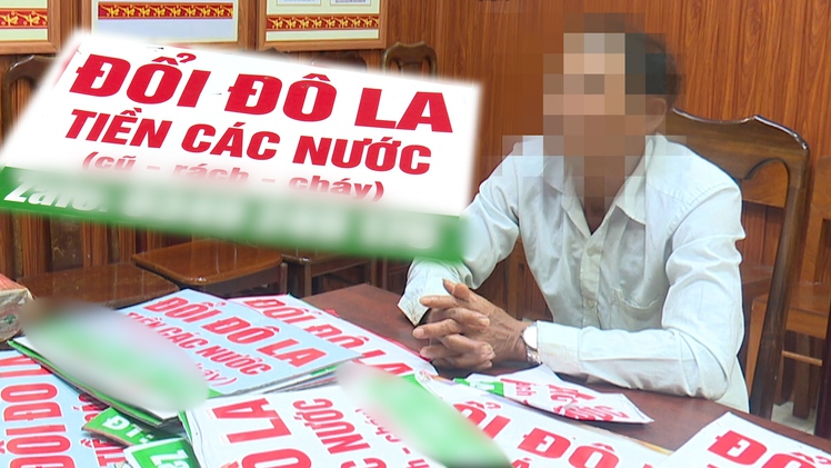 Xử lý nhóm dán biển quảng cáo thu đổi đô la, ngoại tệ trái phép