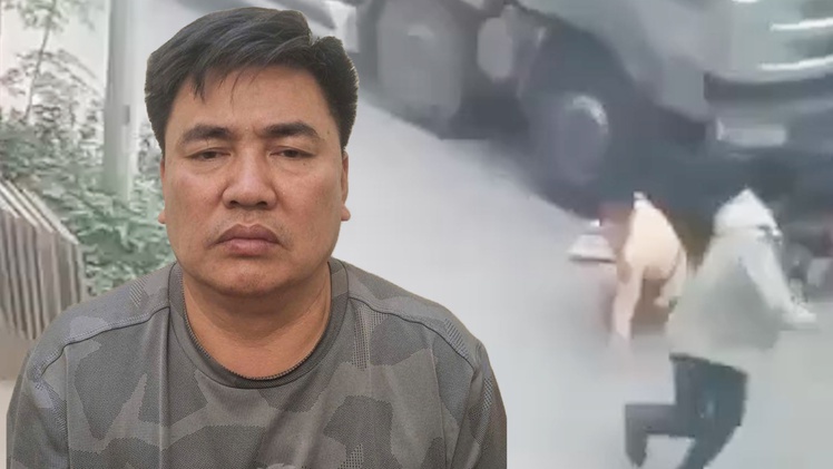 Tạm giữ hình sự tài xế đẩy cảnh sát giao thông vào đầu xe tải