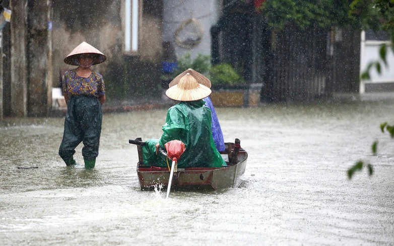 Floods force evacuation of thousands in northern Vietnam, while landslide kills 3 family members 